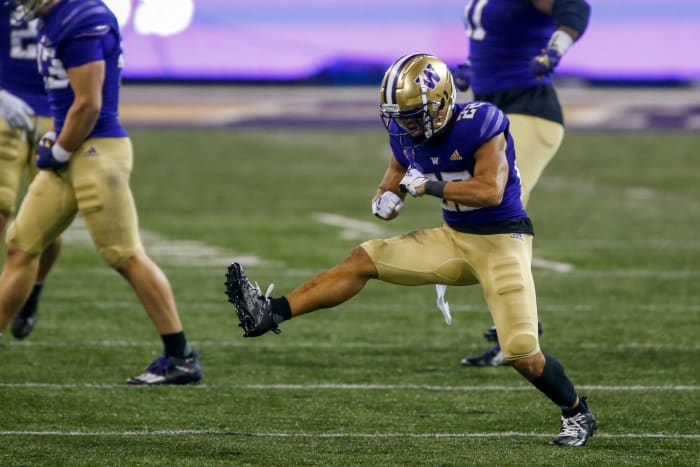 Nov 28, 2020; Seattle, Washington, USA; Washington Huskies defensive back Trent McDuffie (22) reacts following a turnover on downs against the Utah Utes during the third quarter at Alaska Airlines Field at Husky Stadium. Mandatory Credit: Joe Nicholson-USA TODAY Sports